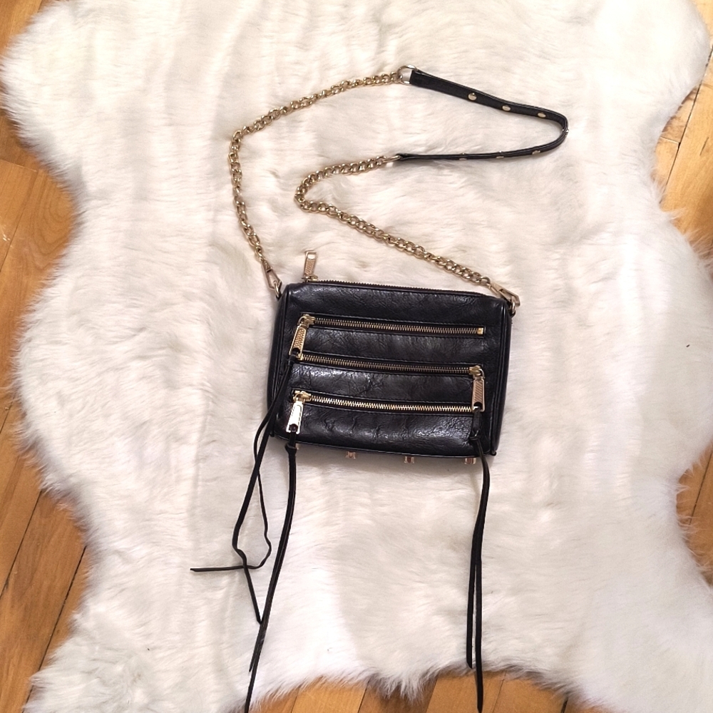 Rebecca Minkoff crossbody bag. Black leather and gold hardware. Great Condition.